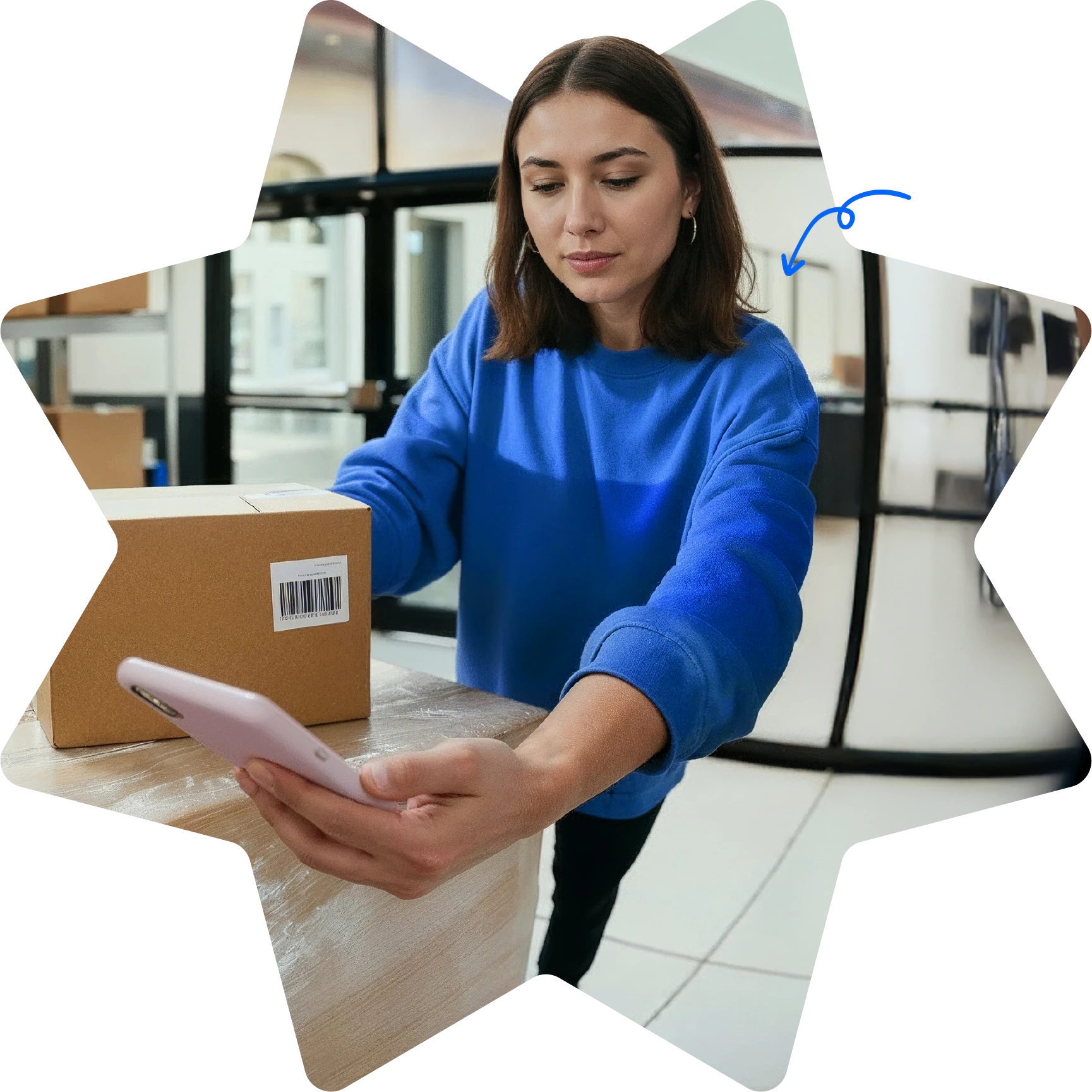 Star-shaped Starshipit homepage hero image showing a warehouse team member packing an order while checking shipping details on a mobile phone Star-shaped Starshipit homepage hero image showing a warehouse team member packing an order while checking shipping details on a mobile phone