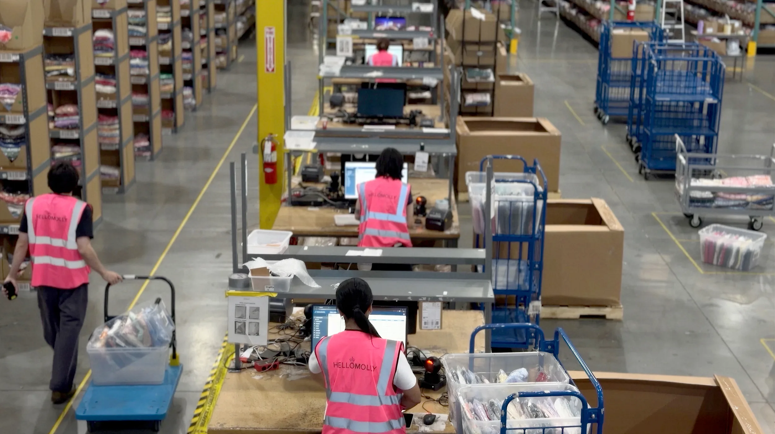 Hello Molly team member preparing customer orders Hello Molly team member preparing customer orders