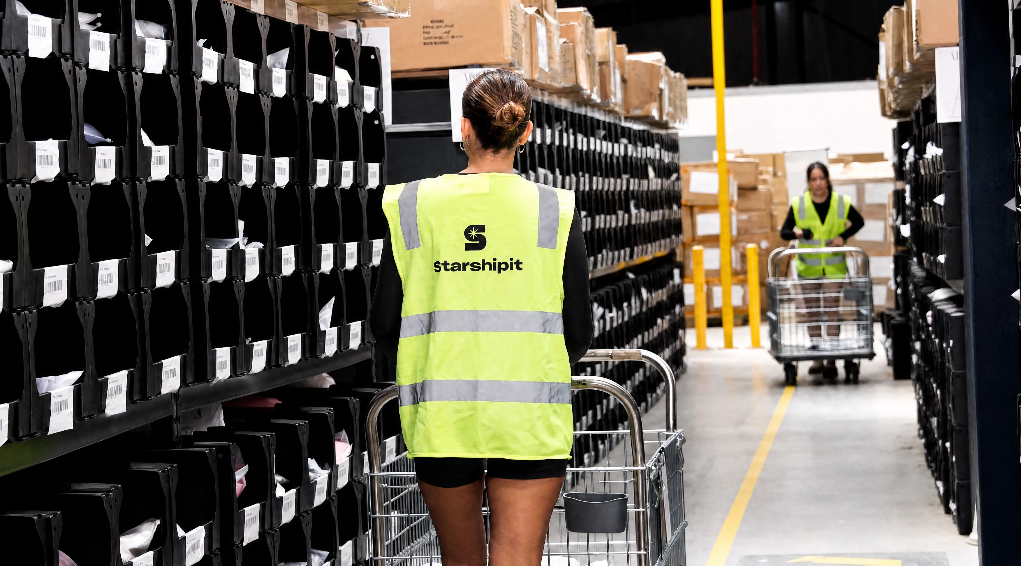 Meshki warehouse team member preparing orders Meshki warehouse team member preparing orders